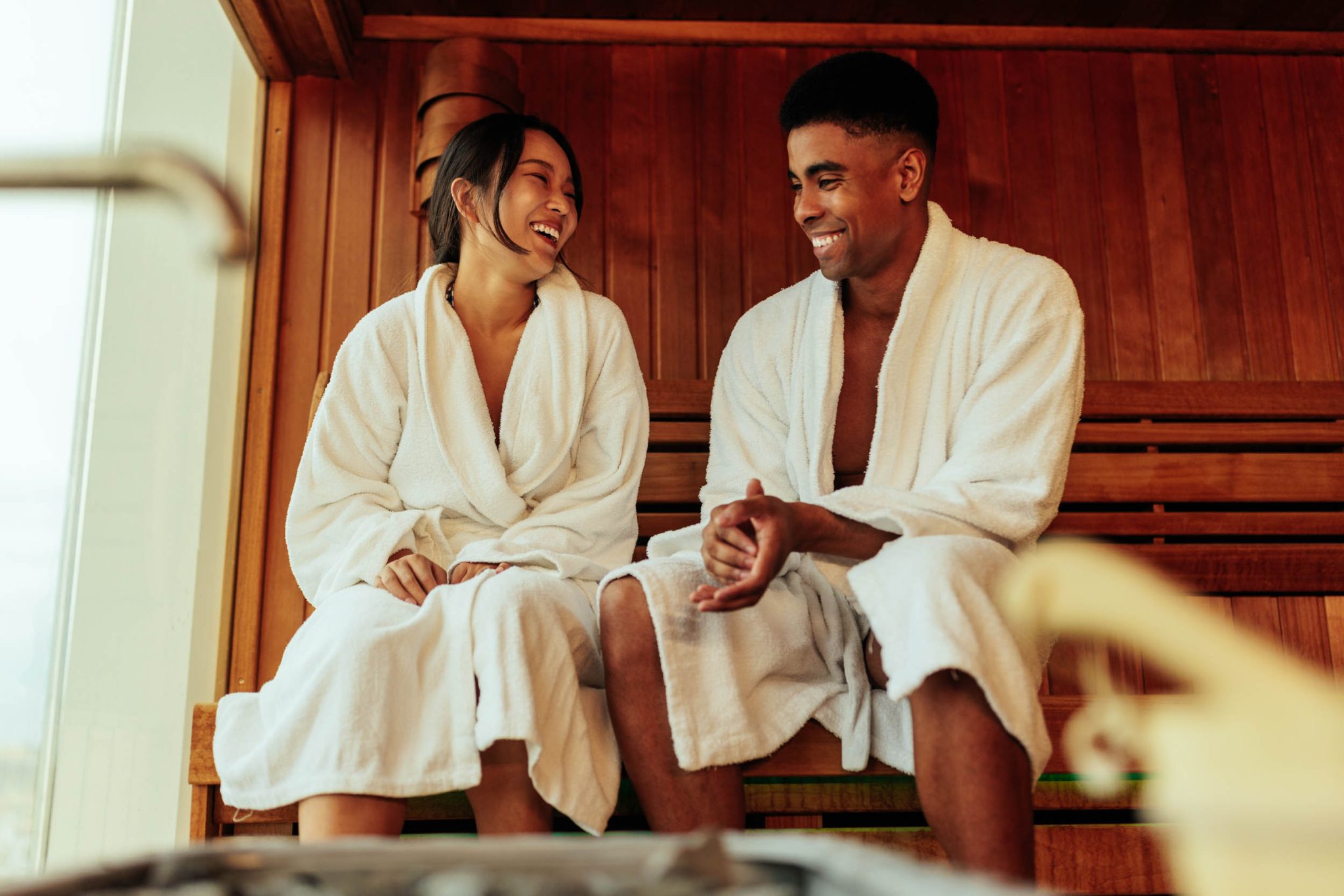 diverse couple in sauna.